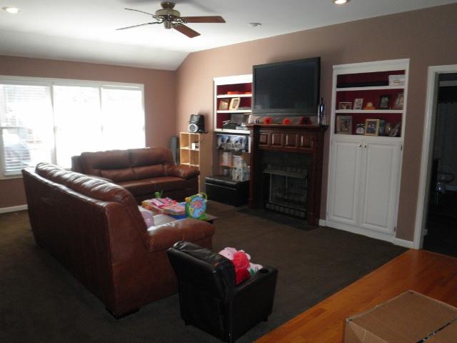 131 Mortons Lake Road Manchester, TN 37355 - Photo 18 of 18 Living room with sits nicely in the wide open floor plan, the dining and foyer flow into kitchen and living area.