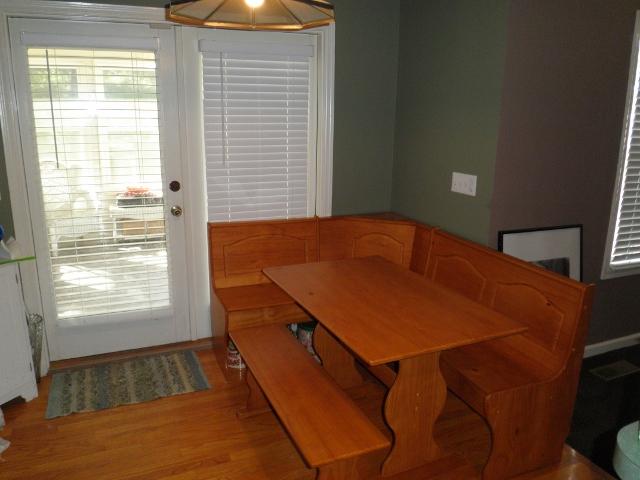 Breakfast nook with frend doors leading into the florida room.