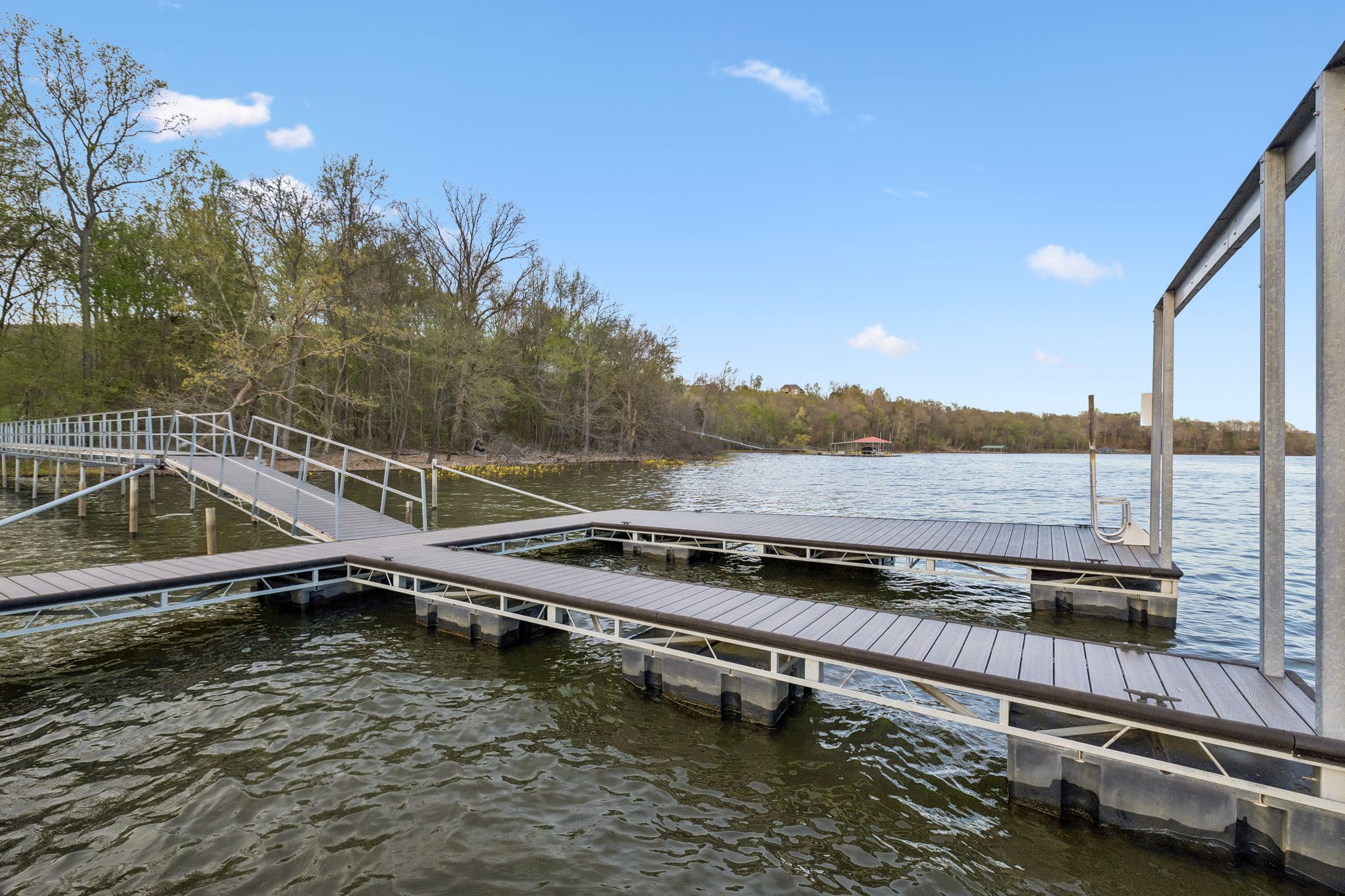 0 River Trace Road Dover, TN 37058 - Photo 13 of 19 a view of a swimming pool with a terrace and trees in the background