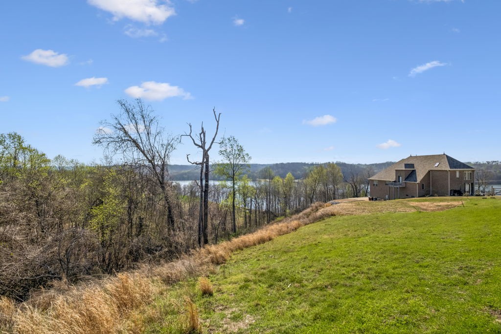 0 River Trace Road Dover, TN 37058 - Photo 3 of 19 a view of a yard with a house in the background