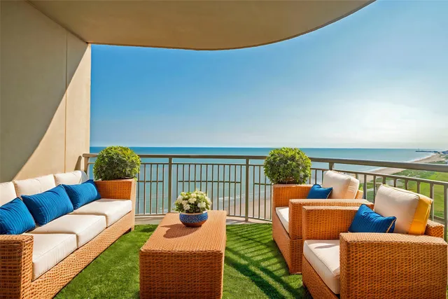 a outdoor living space with furniture and garden view