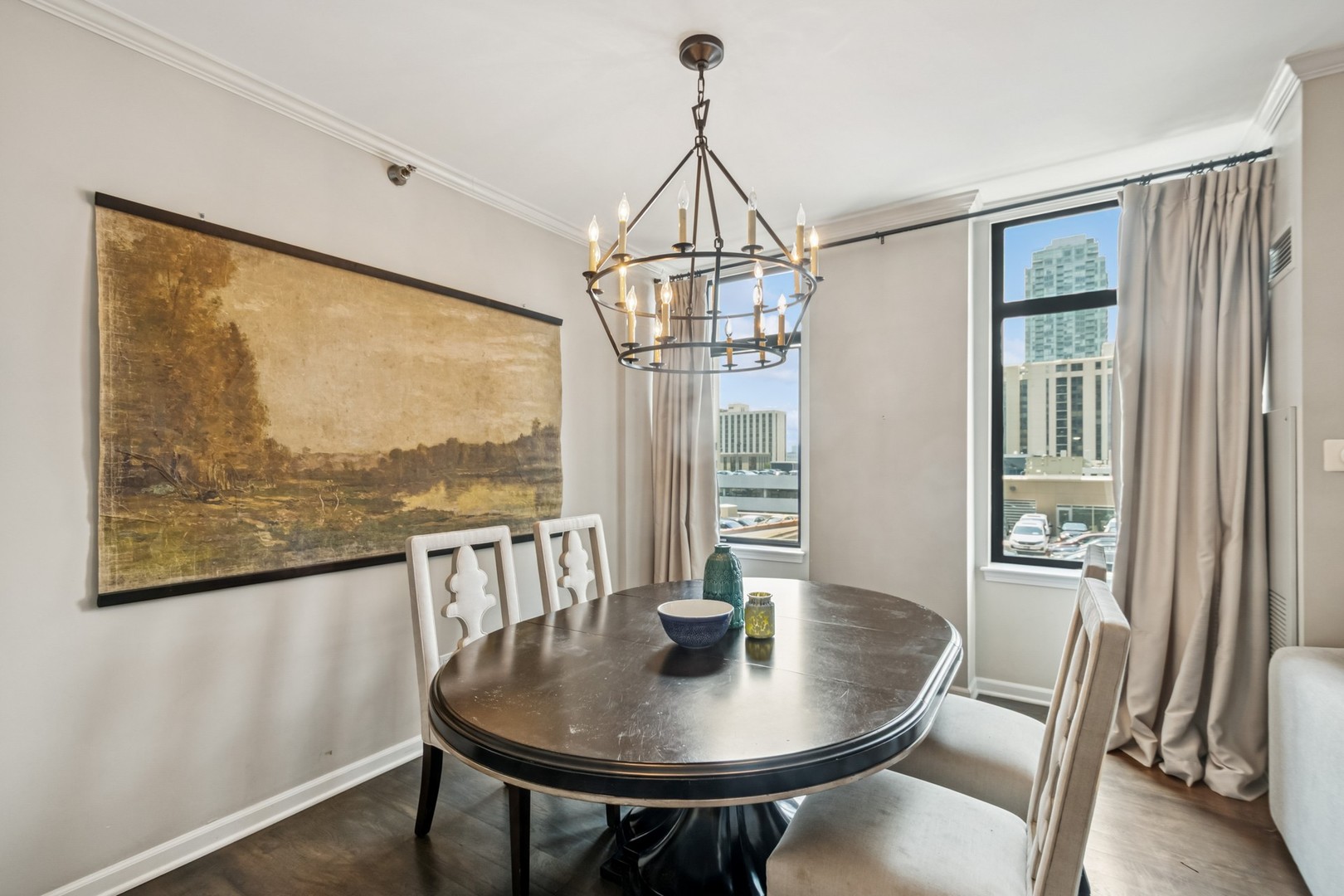 1122 North Dearborn Street, Unit 8E Chicago, IL 60610 - Photo 9 of 16 a view of a dining room with furniture window and wooden floor