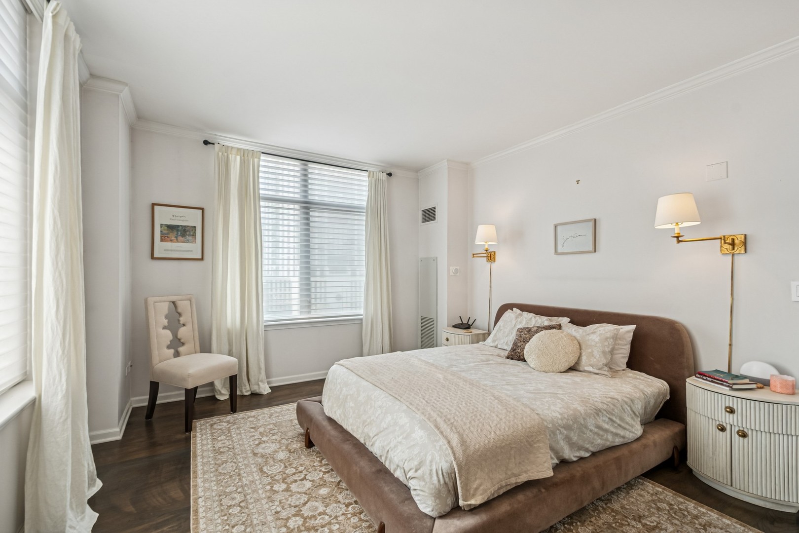 1122 North Dearborn Street, Unit 8E Chicago, IL 60610 - Photo 10 of 16 a bedroom with a bed and a window
