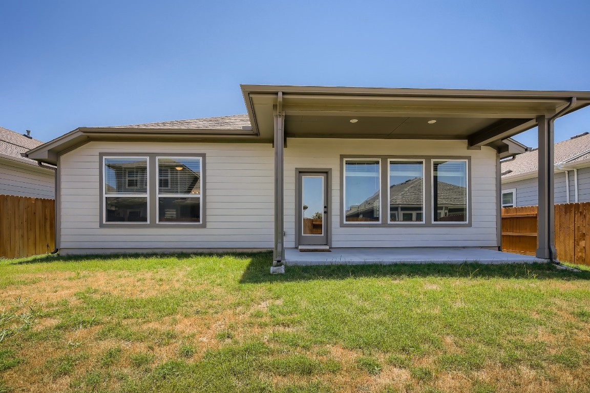 7904 Gilwice Lane Austin, TX 78744 - Photo 24 of 24 a view of a house with a backyard