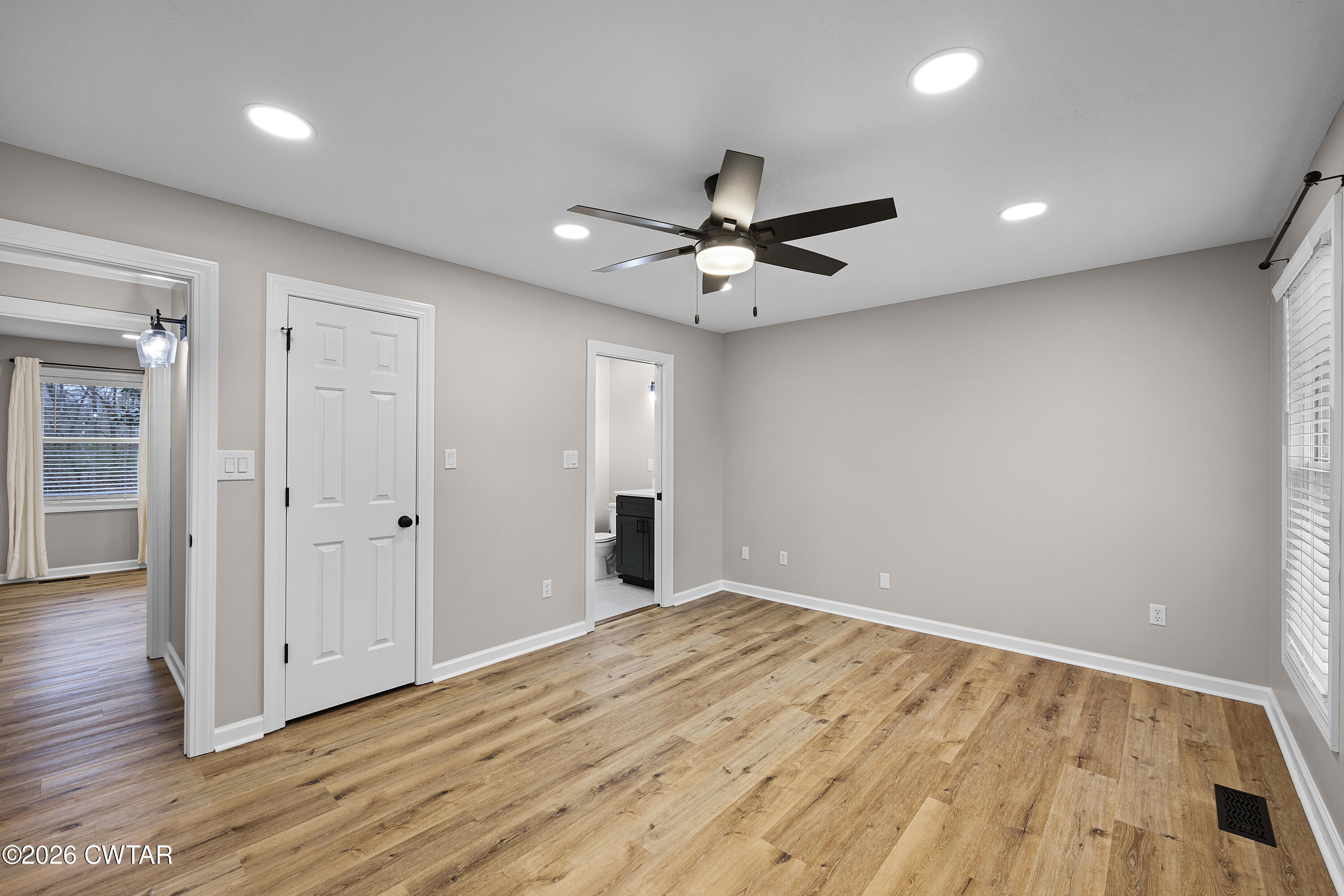 2436 Beech Bluff Road Jackson, TN 38301 - Photo 15 of 18 a view of an empty room with wooden floor
