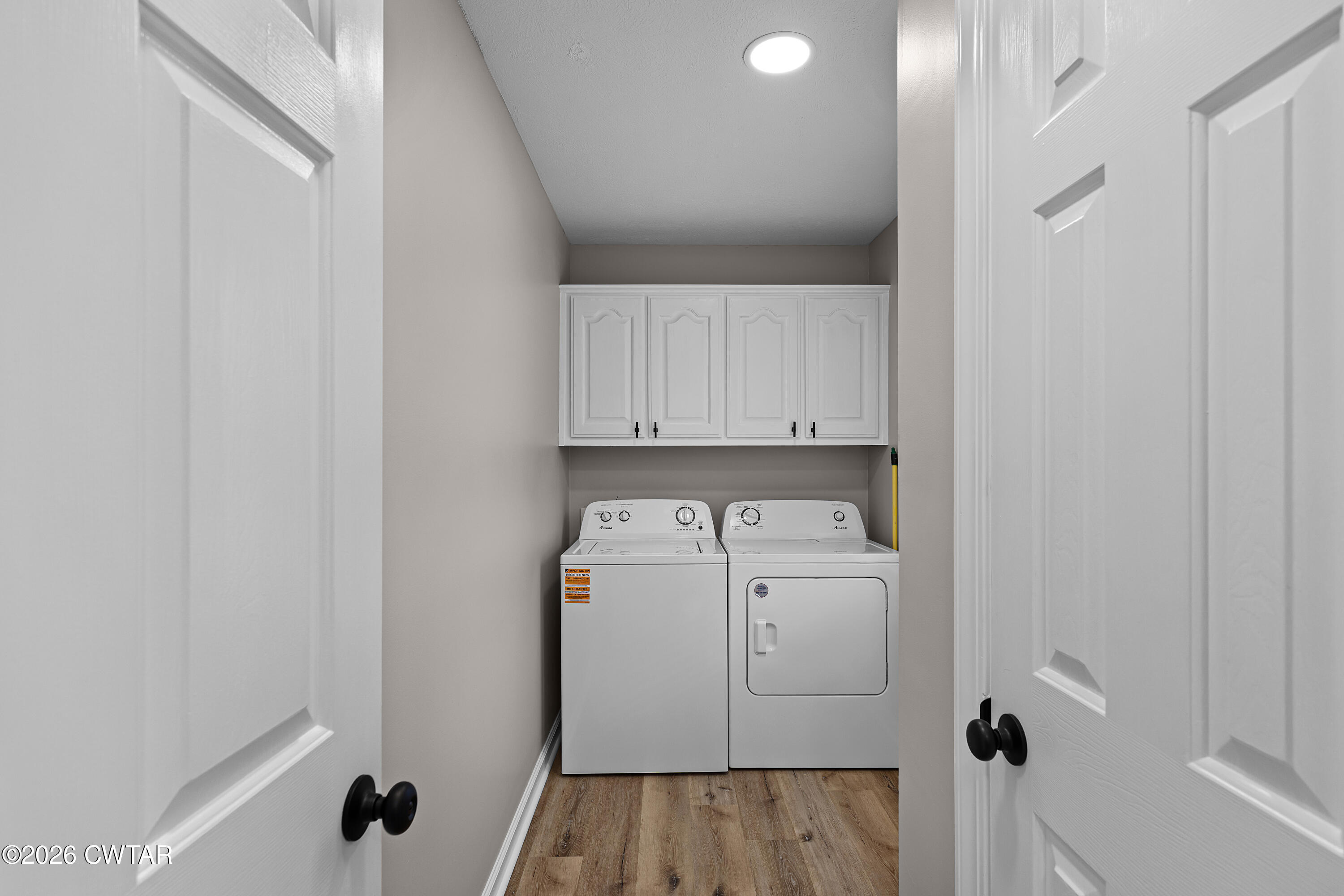 2436 Beech Bluff Road Jackson, TN 38301 - Photo 5 of 18 a utility room with dryer and washer