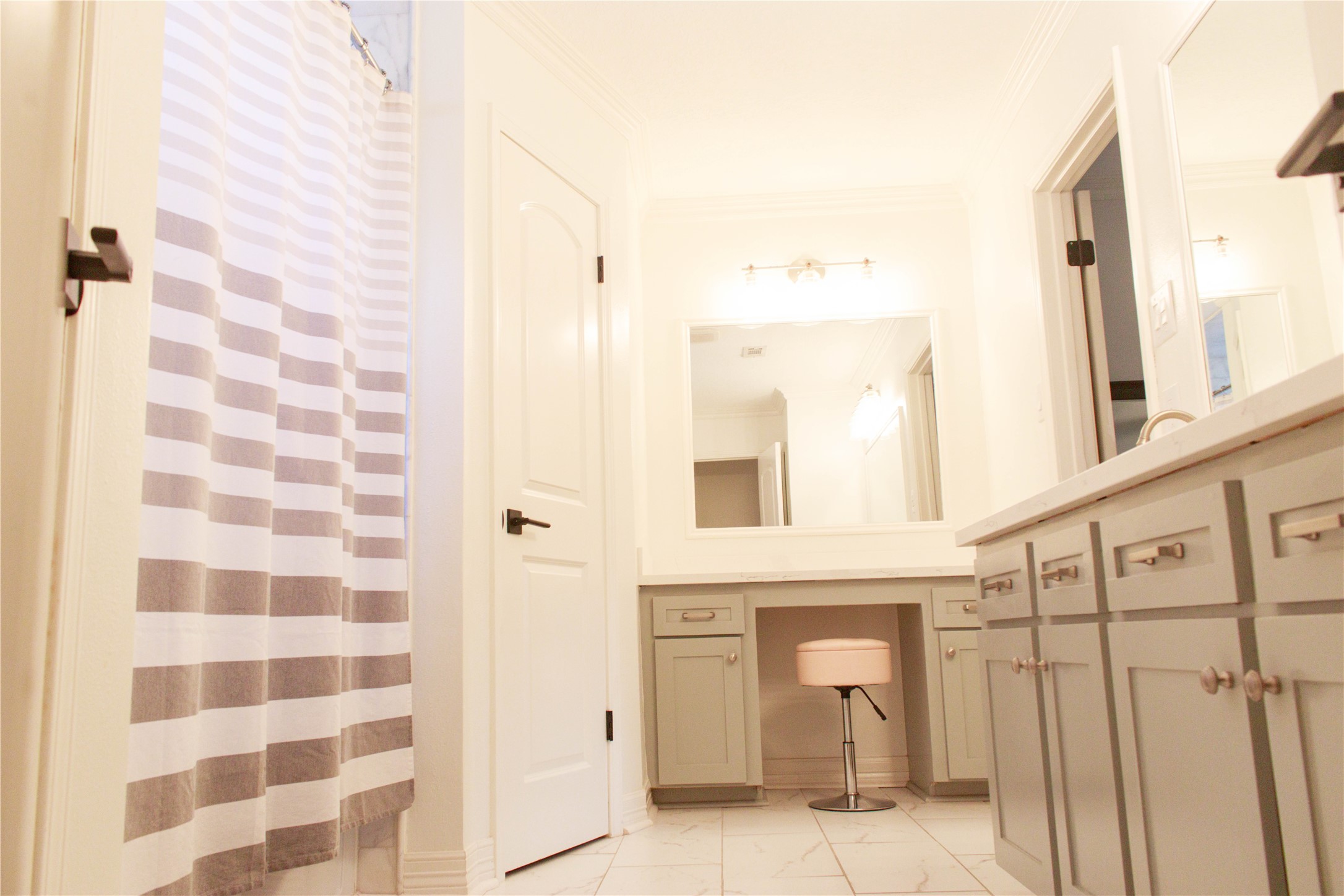 7510 Ralick Court Spring, TX 77379 - Photo 29 of 44 a bathroom with a sink and a mirror
