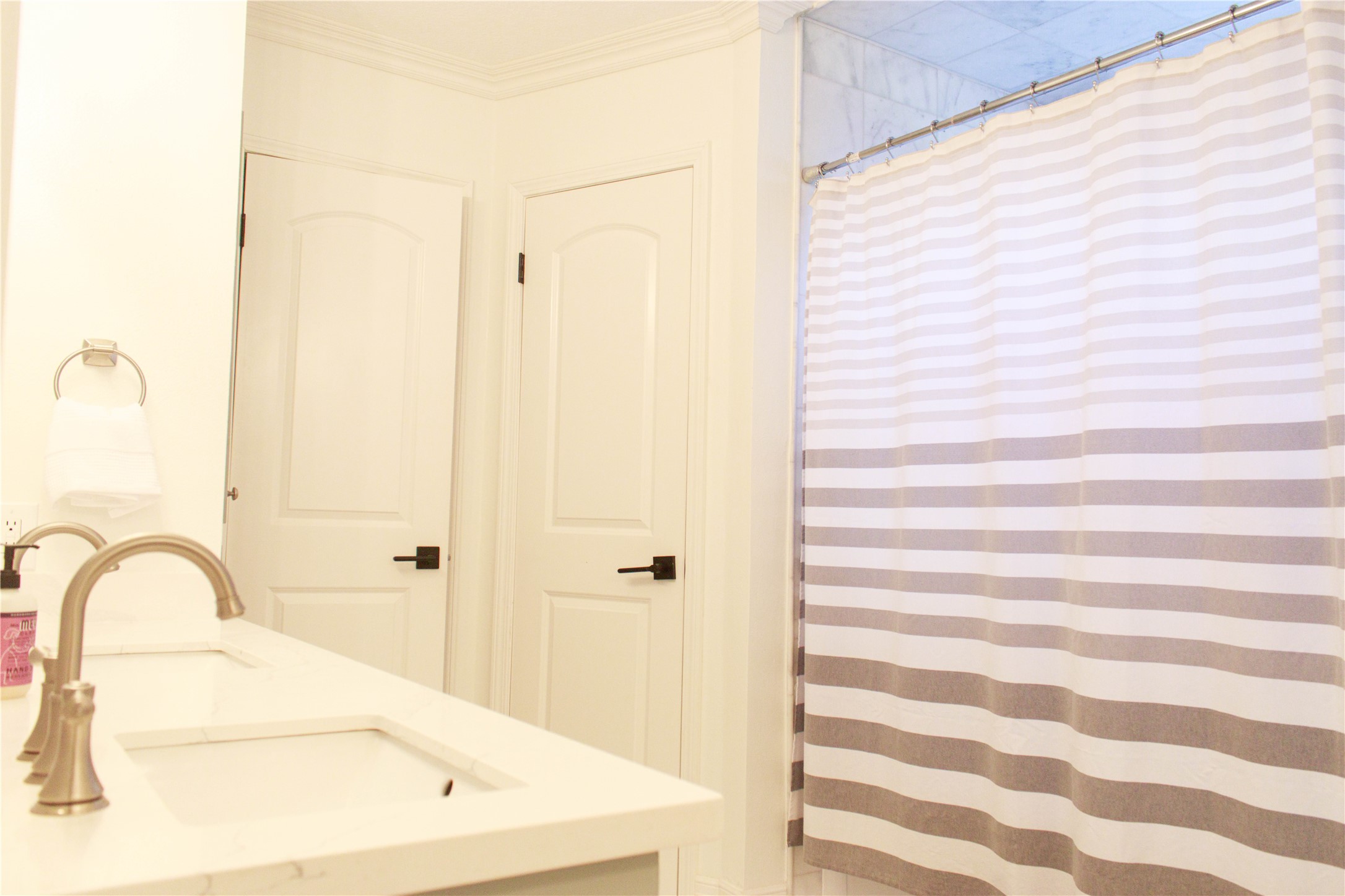 7510 Ralick Court Spring, TX 77379 - Photo 31 of 44 a bathroom with a bathtub and shower