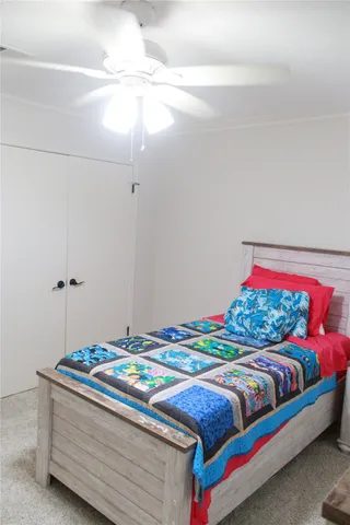 a view of a bedroom with cabinet