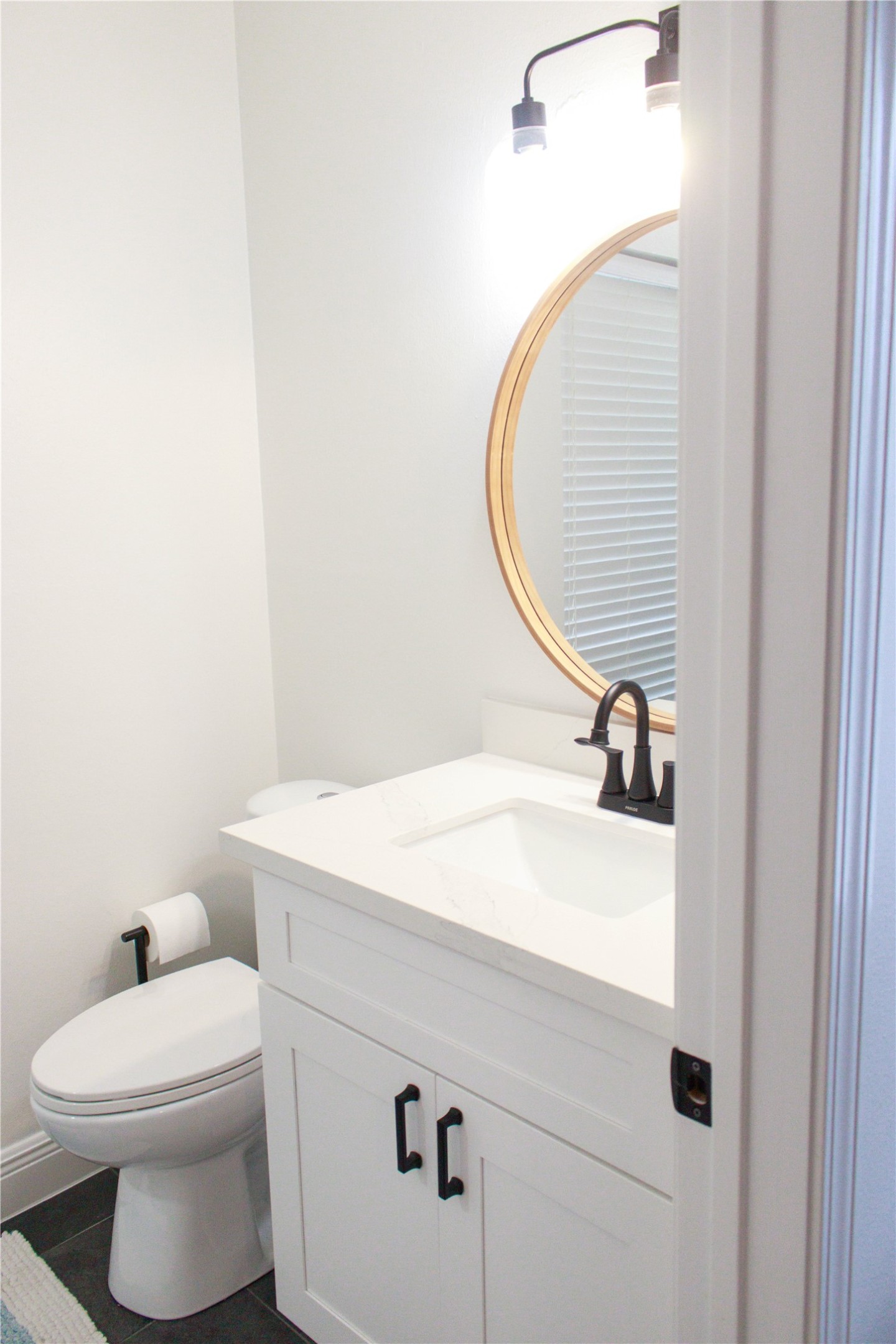 7510 Ralick Court Spring, TX 77379 - Photo 44 of 44 a bathroom with a sink and a mirror