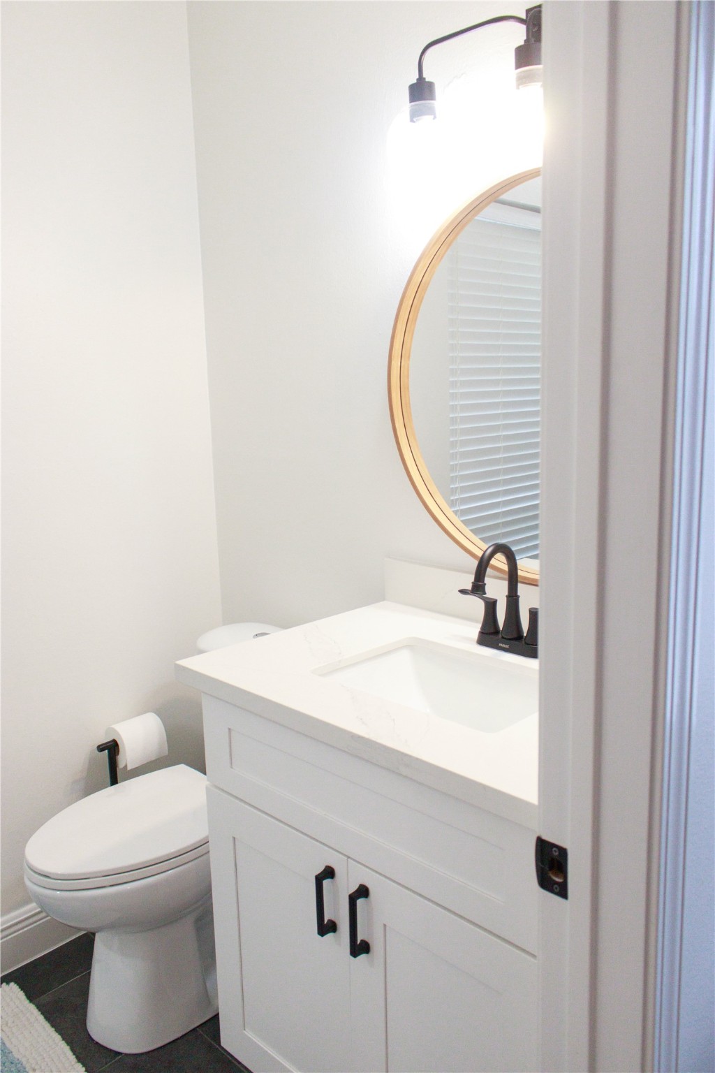 7510 Ralick Court Spring, TX 77379 - Photo 44 of 44 a bathroom with a sink and a mirror
