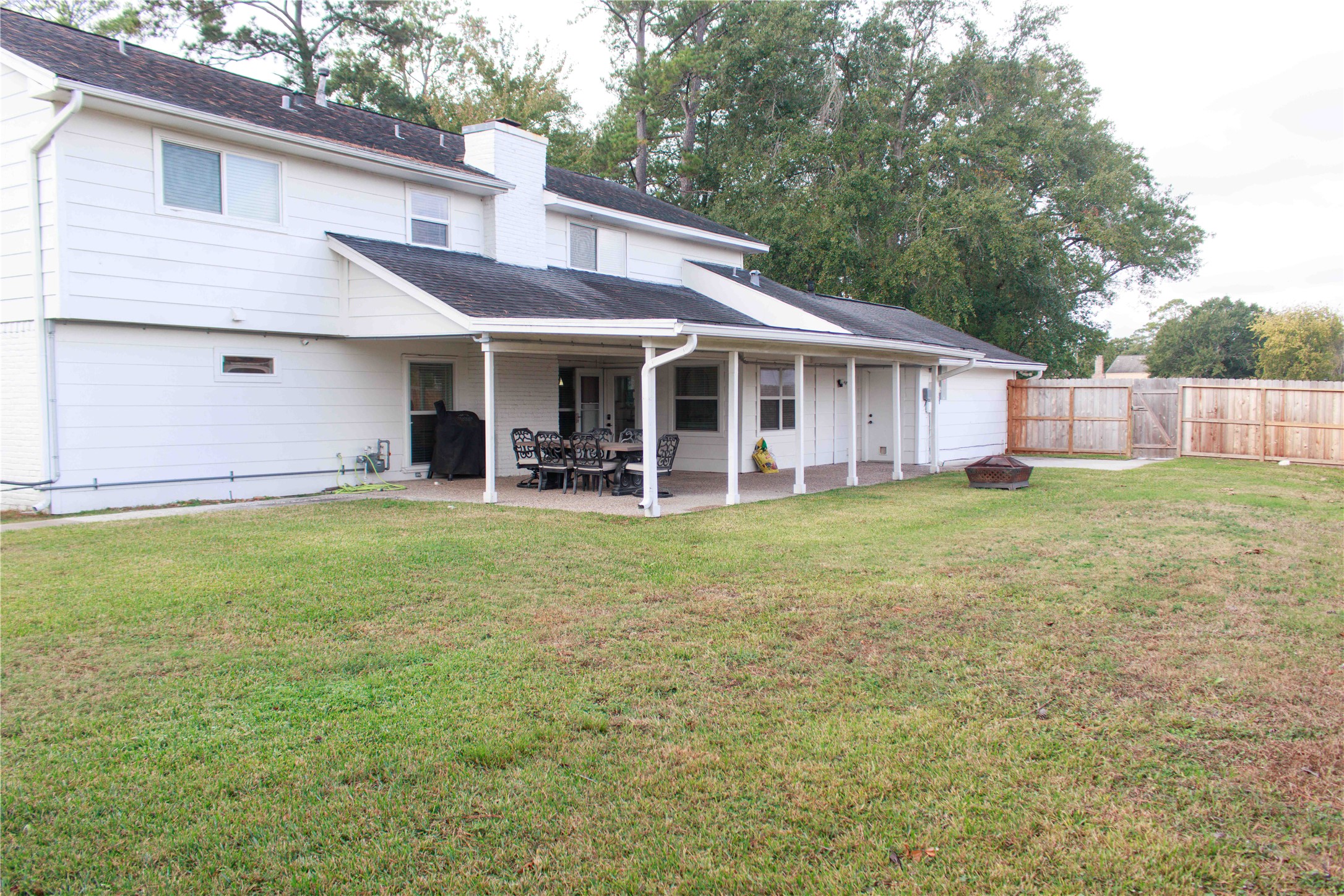 7510 Ralick Court Spring, TX 77379 - Photo 9 of 44 a view of a house with a yard and sitting area