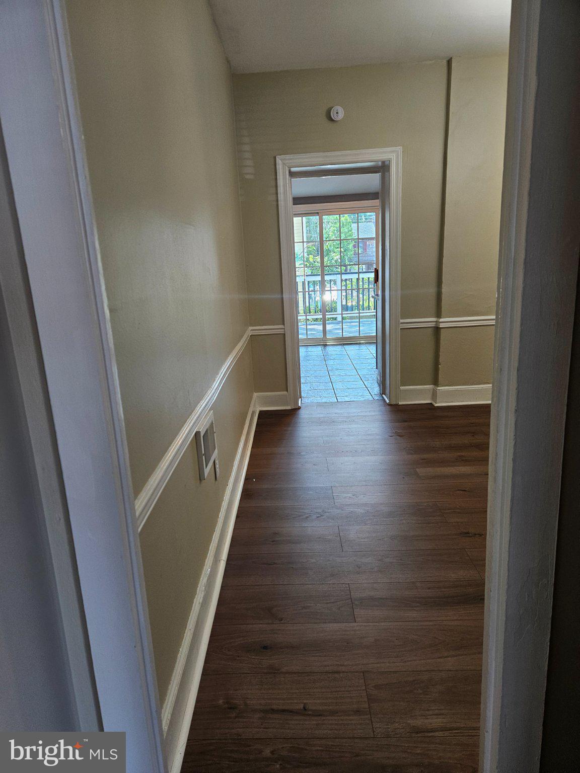 53 West 4th Street New Castle, DE 19720 - Photo 5 of 21 Inviting hallway with natural light.
