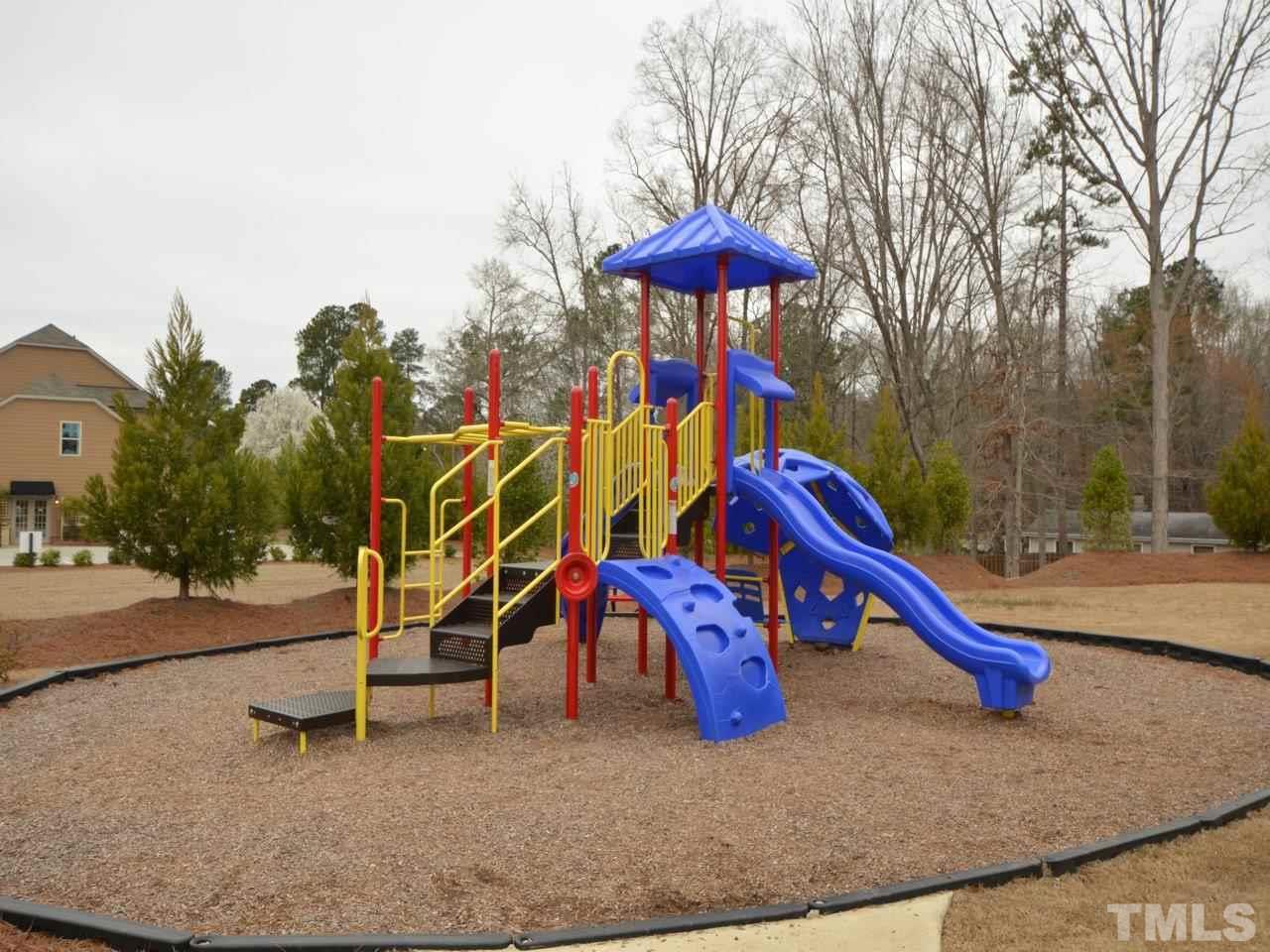 760 Wickham Ridge Road Apex, NC 27539 - Photo 23 of 25 a view of outdoor space with seating