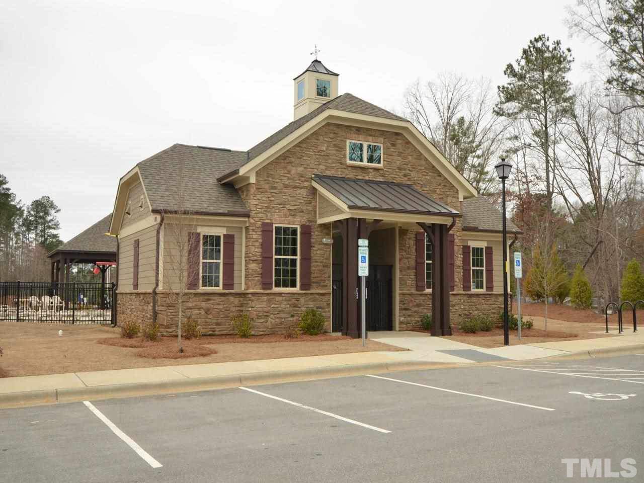 760 Wickham Ridge Road Apex, NC 27539 - Photo 25 of 25 a front view of a house with a yard