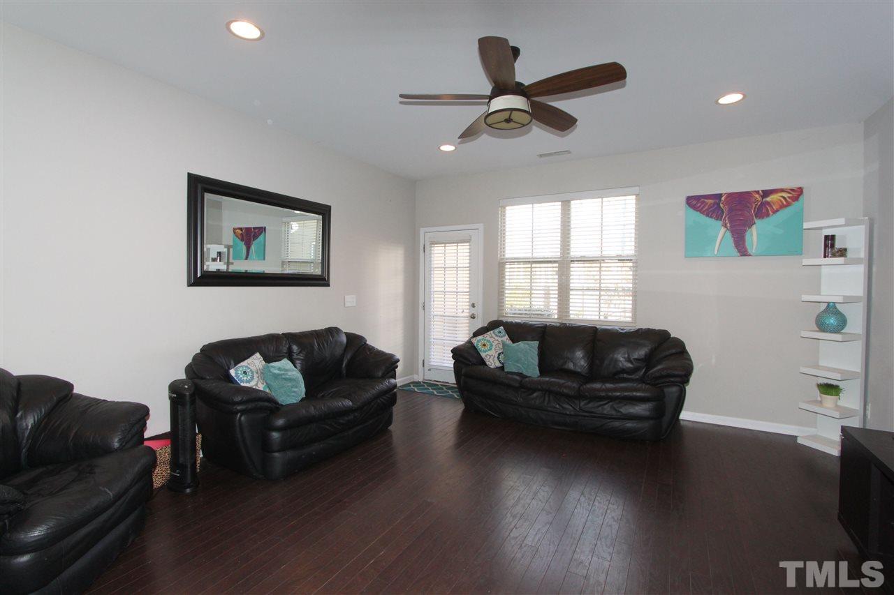 760 Wickham Ridge Road Apex, NC 27539 - Photo 9 of 25 a living room with furniture and a window