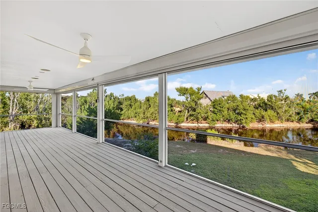 a view of swimming pool from a balcony