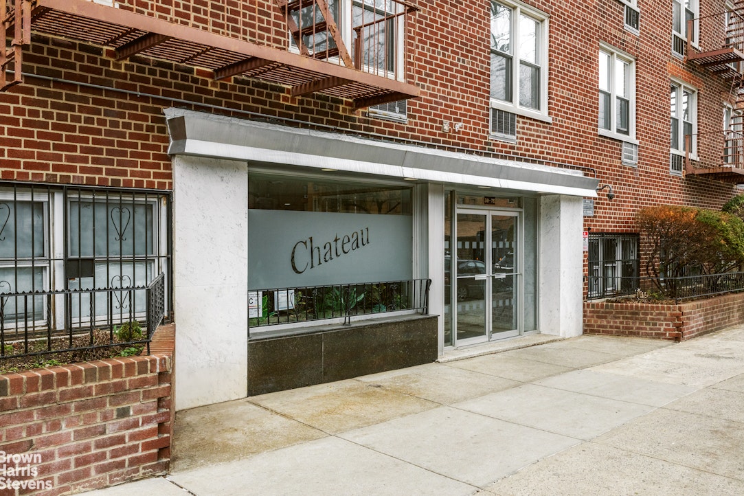 39-76 57th Street, Unit 4G Queens, NY 11377 - Photo 7 of 8 a view of a brick building with a door and a window