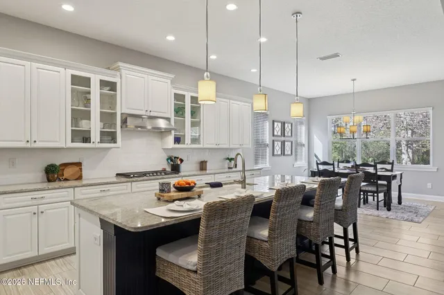 a front view of house with yard and outdoor seating
