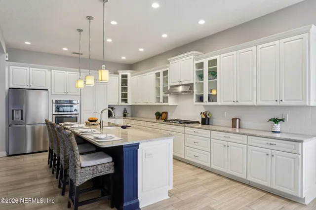 a room with gym equipment and a large window