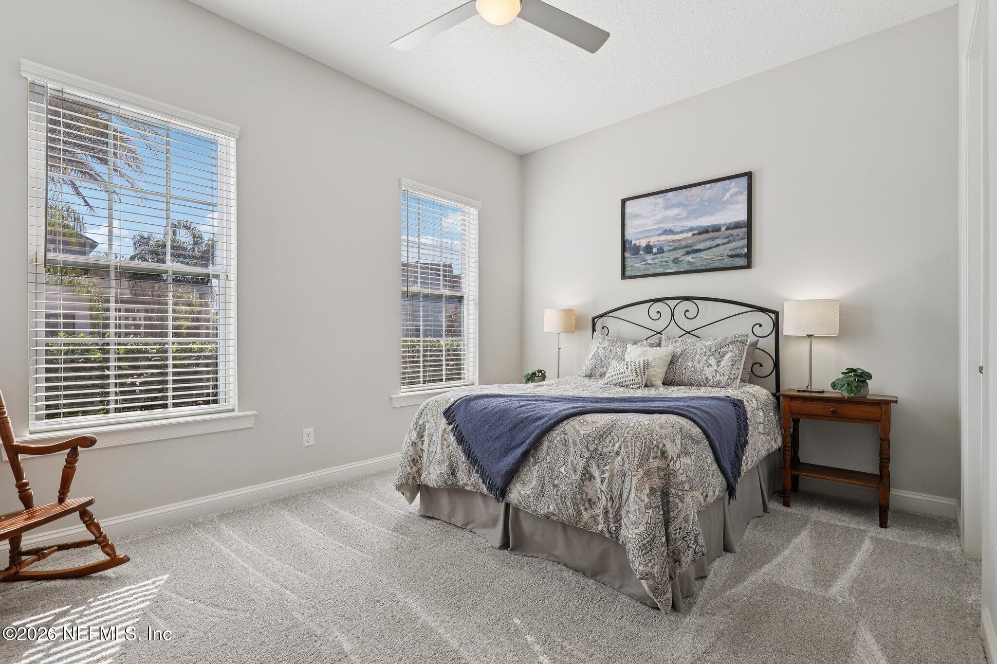 147 Dock House Road St. Johns, FL 32259 - Photo 22 of 67 a bedroom with a bed and a window