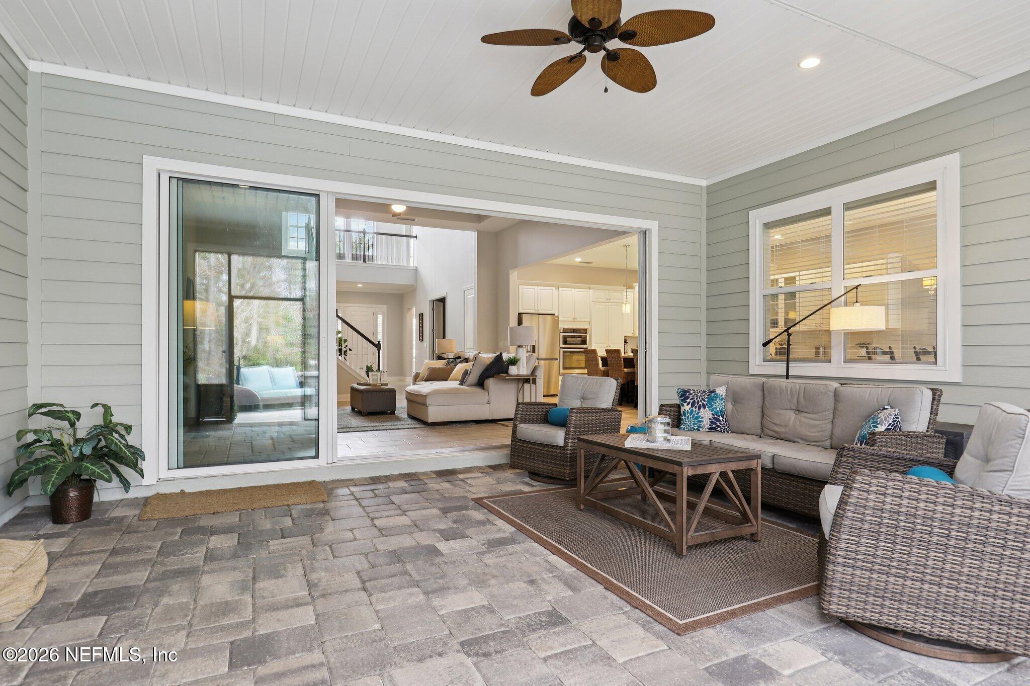 147 Dock House Road St. Johns, FL 32259 - Photo 36 of 67 a living room with furniture and a large window