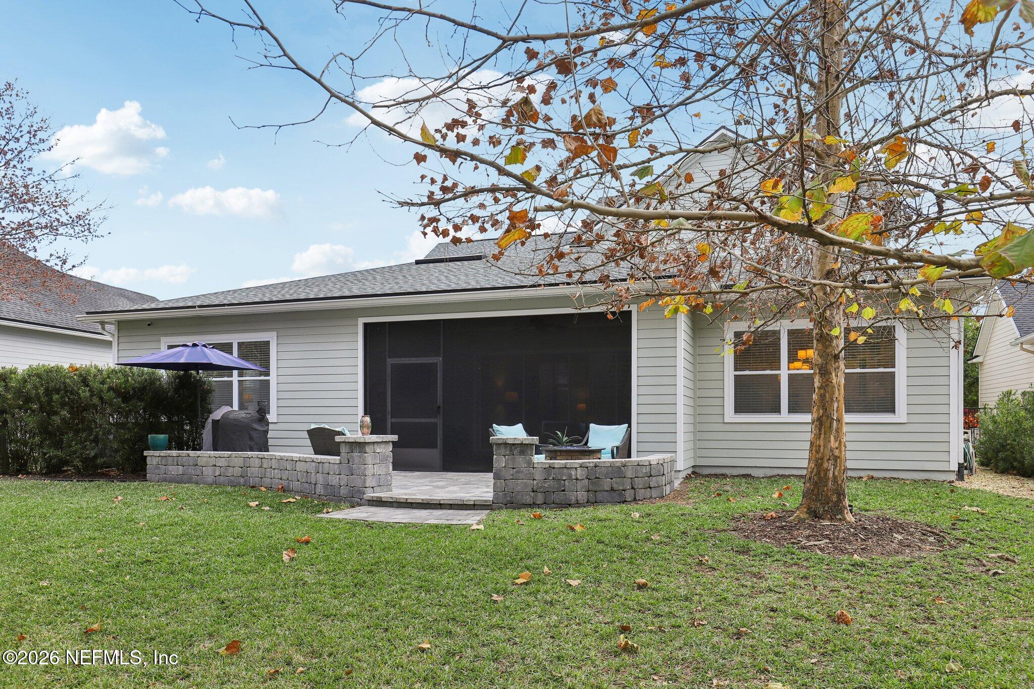 147 Dock House Road St. Johns, FL 32259 - Photo 49 of 67 a front view of a house with garden