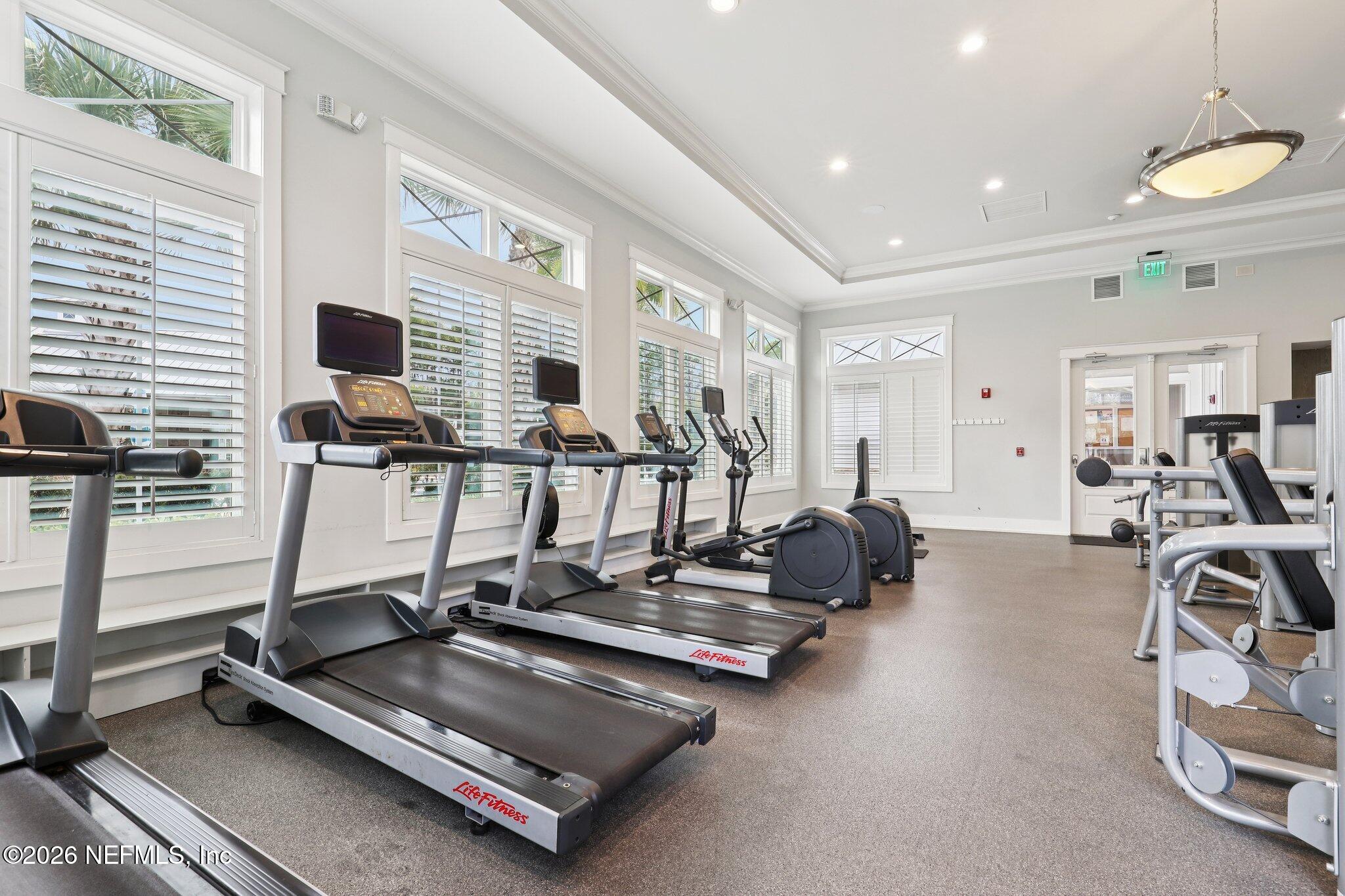147 Dock House Road St. Johns, FL 32259 - Photo 53 of 67 a room with gym equipment and a large window