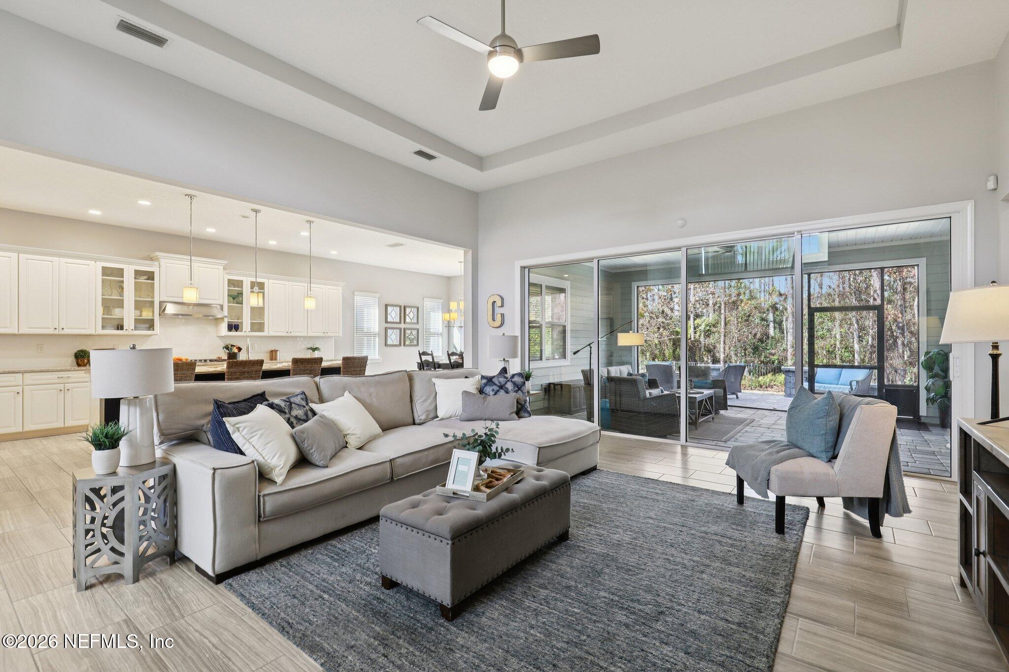 147 Dock House Road St. Johns, FL 32259 - Photo 8 of 67 a living room with furniture and a view of kitchen