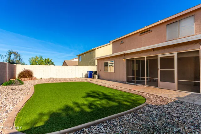a view of back yard of the house