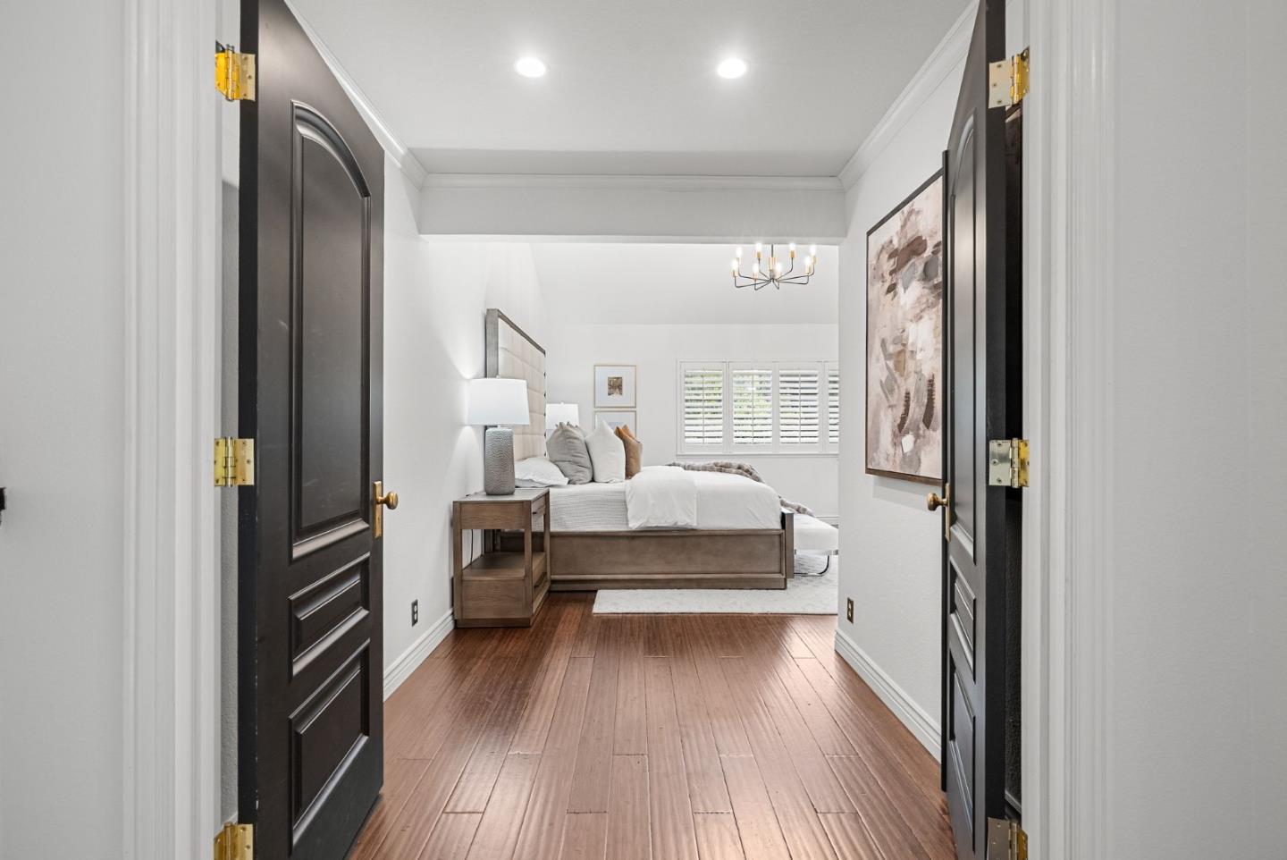 1147 Longshore Drive San Jose, CA 95128 - Photo 11 of 28 a bedroom with a bed and wooden floor