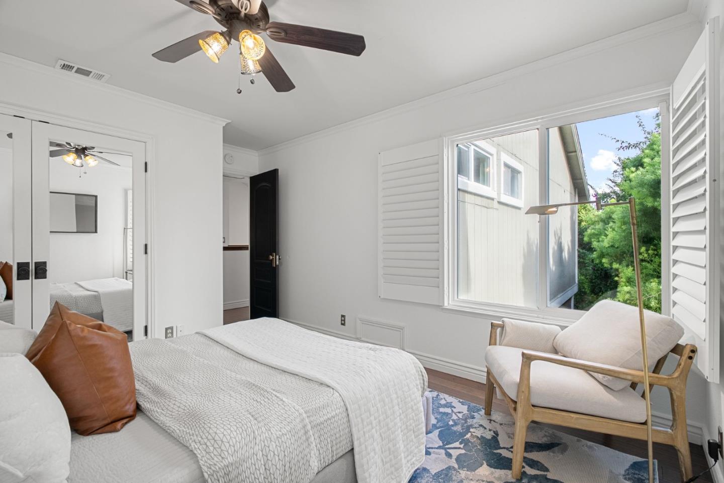 1147 Longshore Drive San Jose, CA 95128 - Photo 17 of 28 a bedroom with a bed and a chair