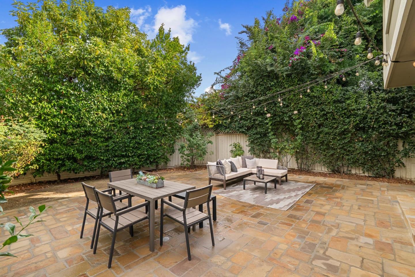 1147 Longshore Drive San Jose, CA 95128 - Photo 21 of 28 a view of backyard with table and chairs and potted plants