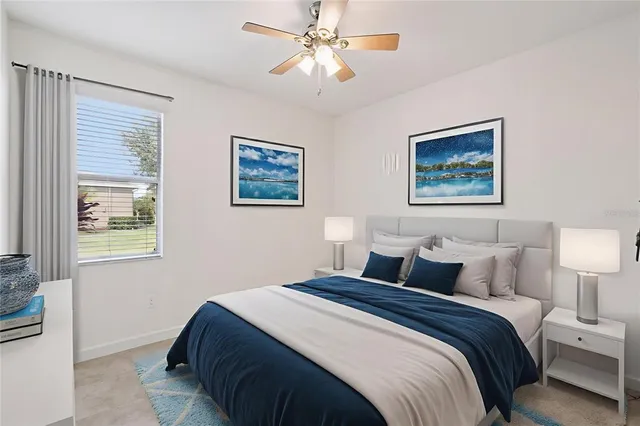 a large kitchen with stainless steel appliances granite countertop a stove top oven a sink dishwasher a refrigerator and cabinets with wooden floor