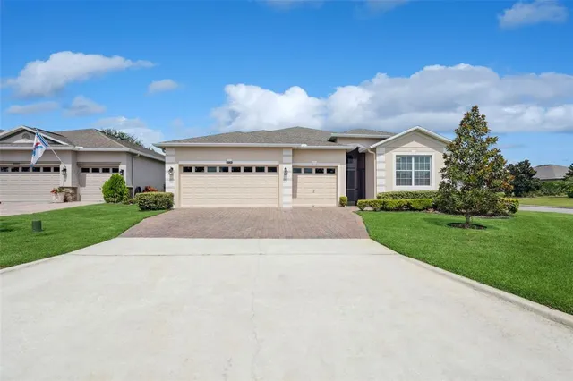 a house with garden in front of it