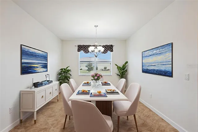 a view of a dining room with furniture