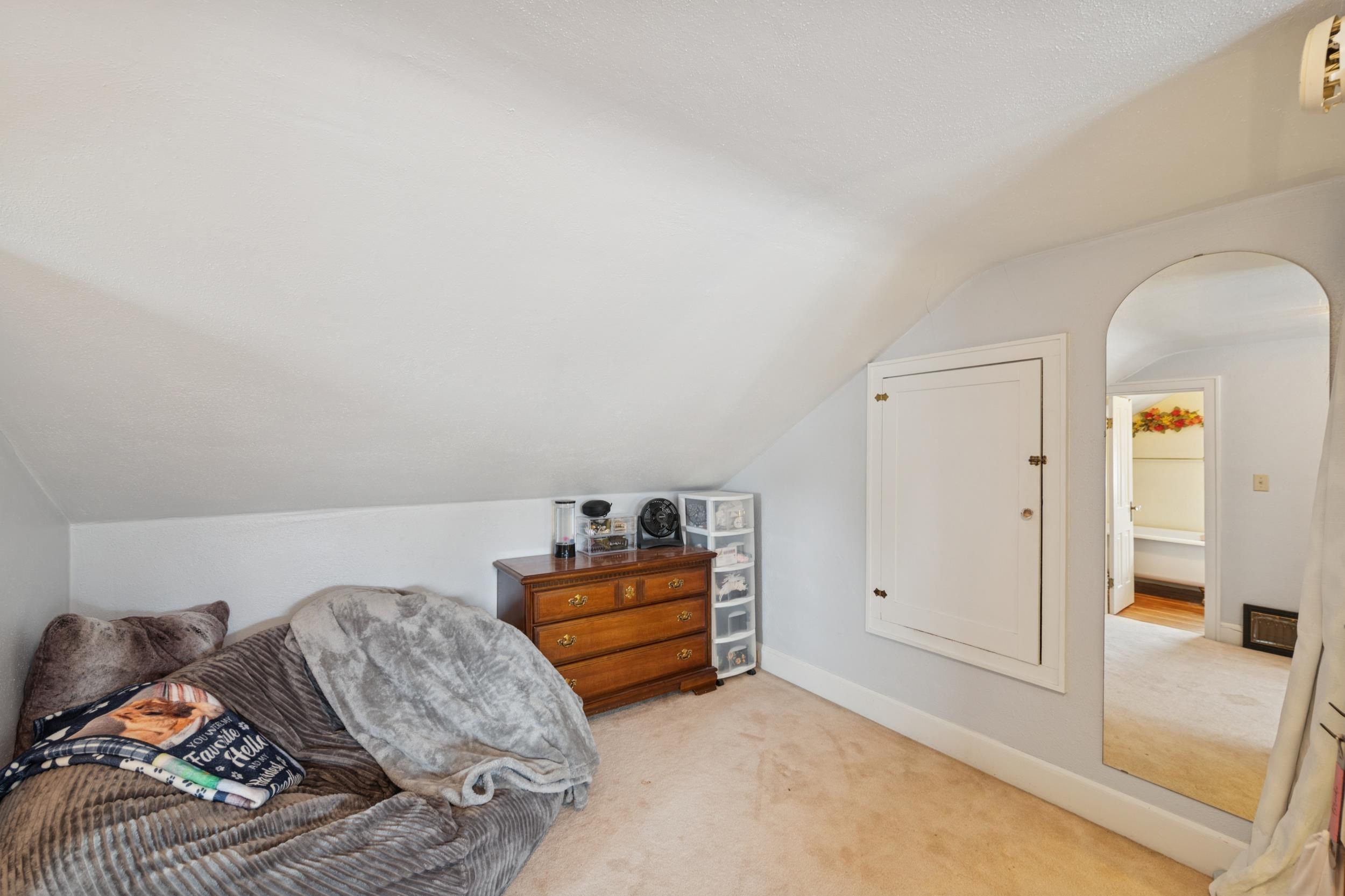 220 5th Avenue West Washburn, WI 54891 - Photo 18 of 38 Carpeted bedroom with vaulted ceiling