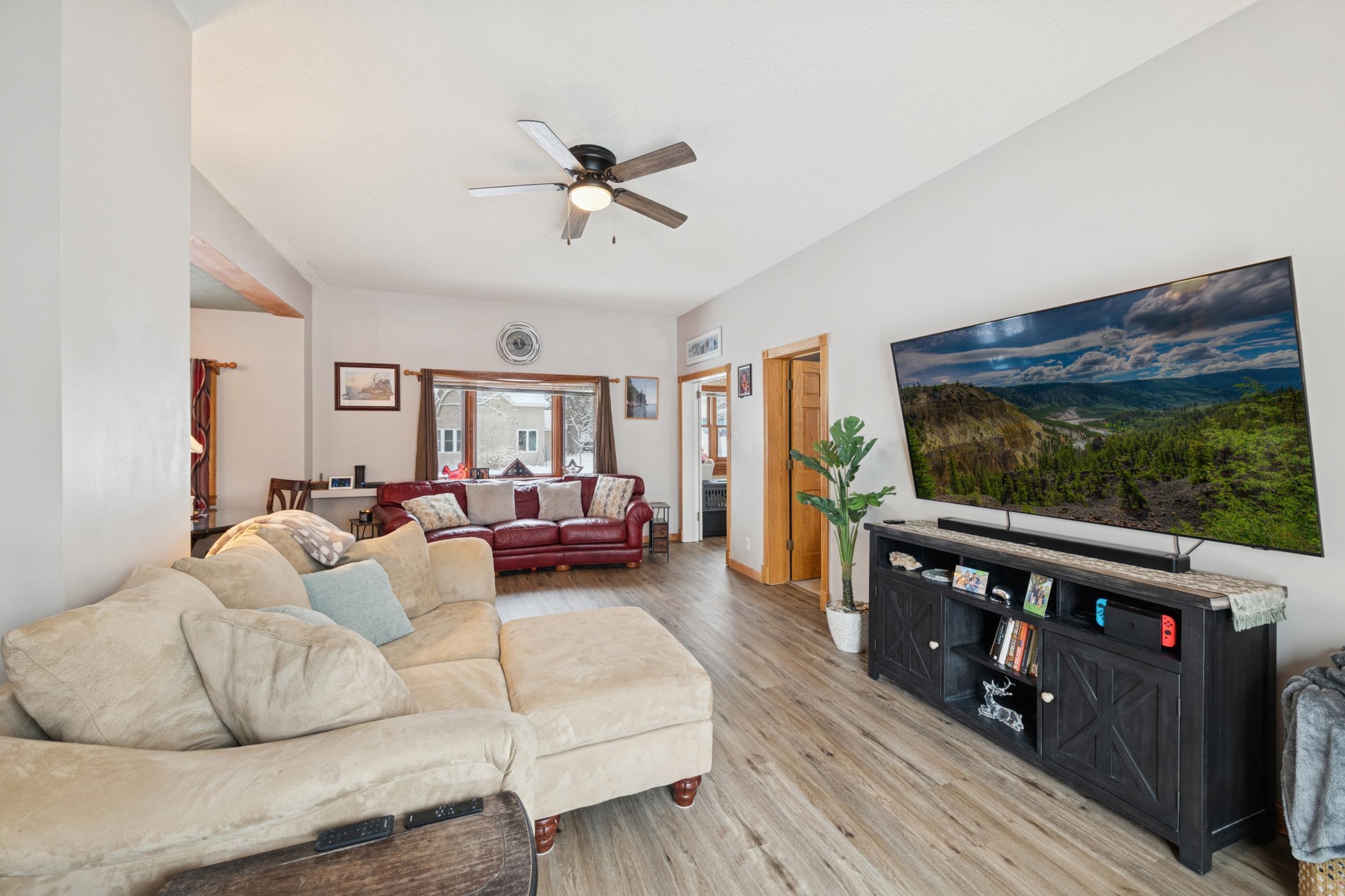 220 5th Avenue West Washburn, WI 54891 - Photo 4 of 38 Living area featuring a ceiling fan and light wood-type flooring