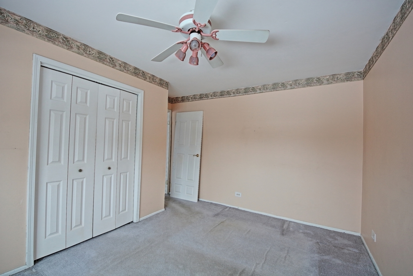 234 Windsor Drive Bolingbrook, IL 60440 - Photo 12 of 22 a view of a room with a fan