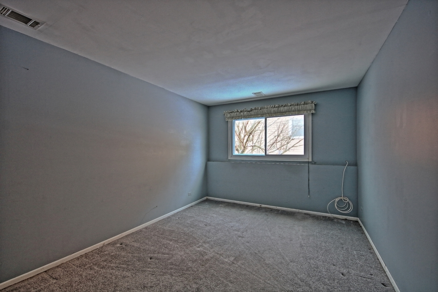 234 Windsor Drive Bolingbrook, IL 60440 - Photo 15 of 22 a view of an empty room with a window