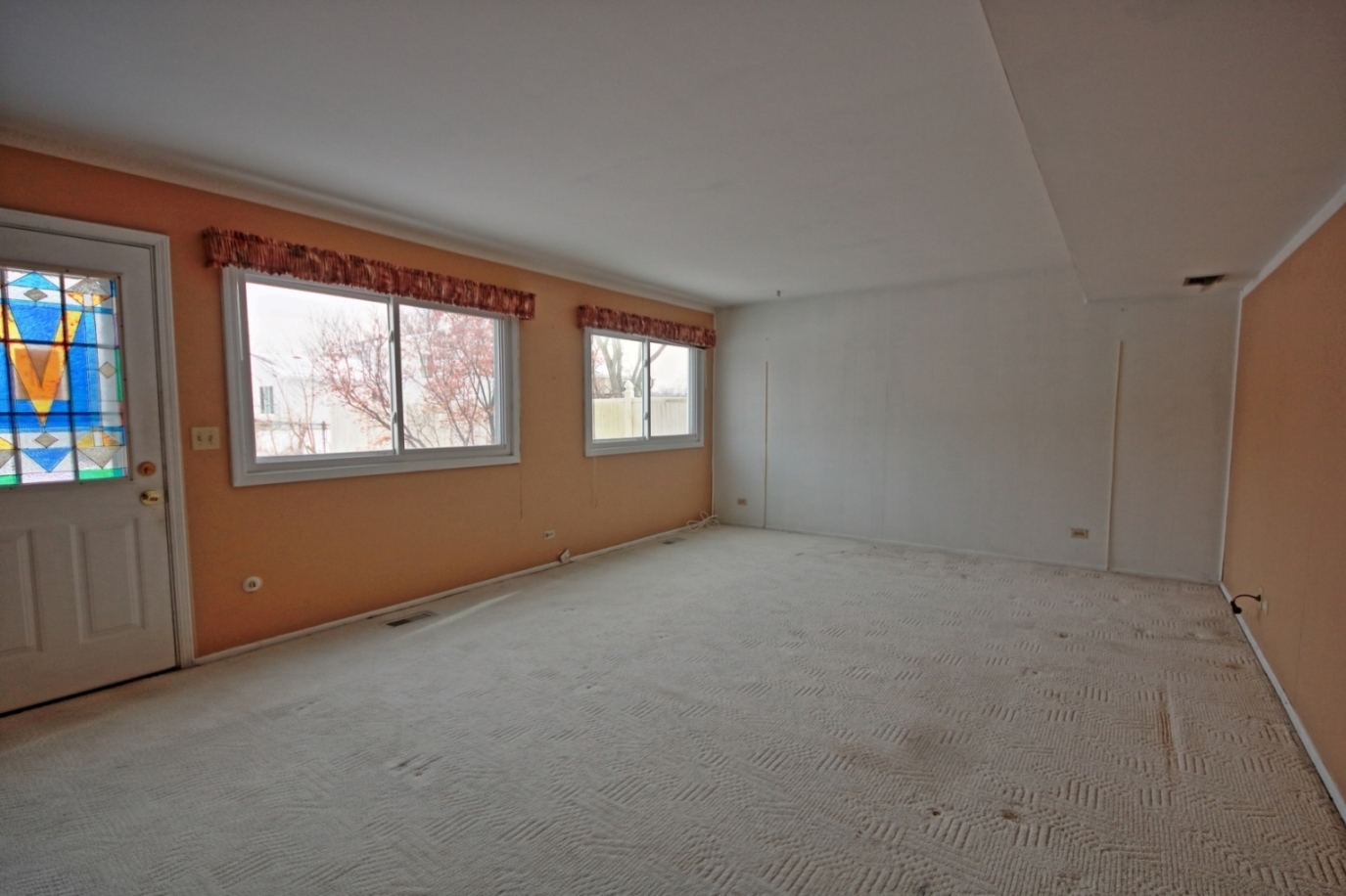 234 Windsor Drive Bolingbrook, IL 60440 - Photo 17 of 22 an empty room with windows