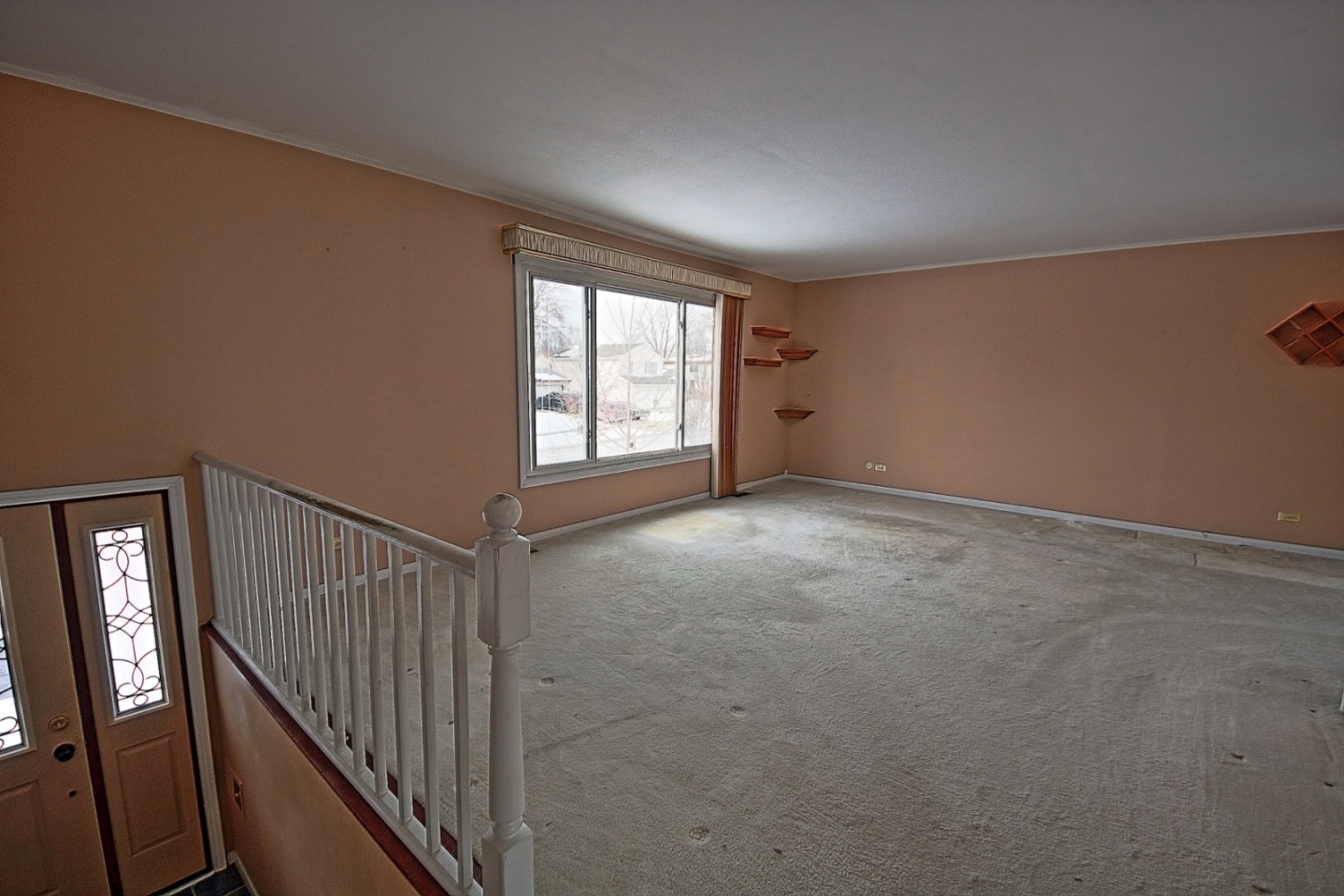 234 Windsor Drive Bolingbrook, IL 60440 - Photo 2 of 22 a view of an empty room with wooden floor and windows
