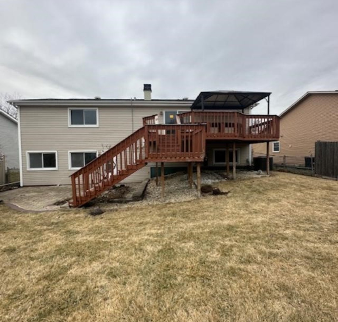 234 Windsor Drive Bolingbrook, IL 60440 - Photo 21 of 22 a view of a house with backyard and sitting area