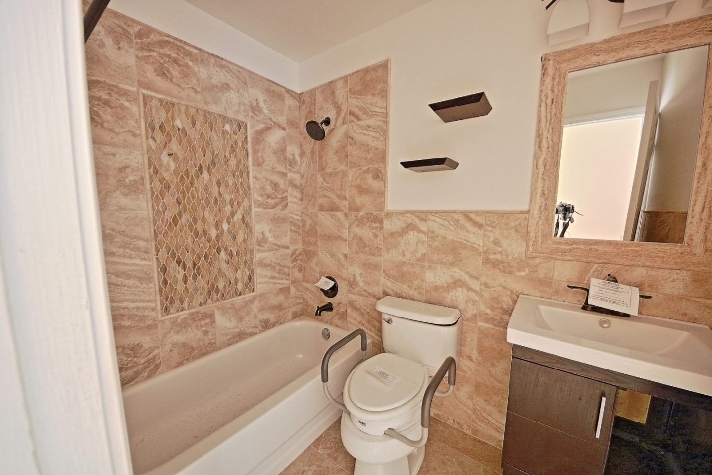 234 Windsor Drive Bolingbrook, IL 60440 - Photo 8 of 22 a bathroom with a sink toilet and shower