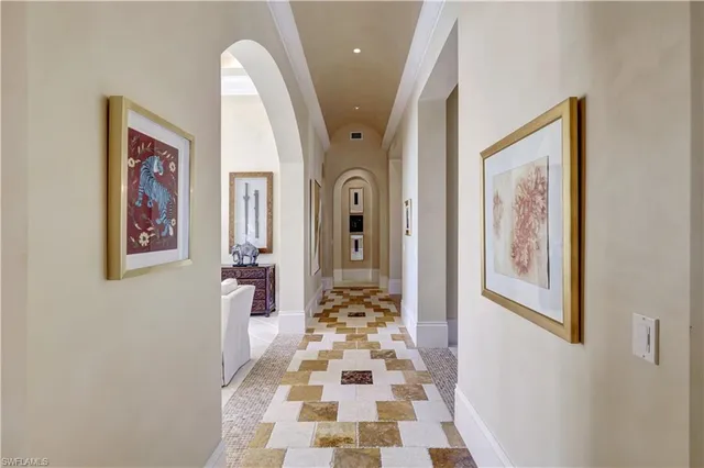 a view of a hallway view with three black white walls