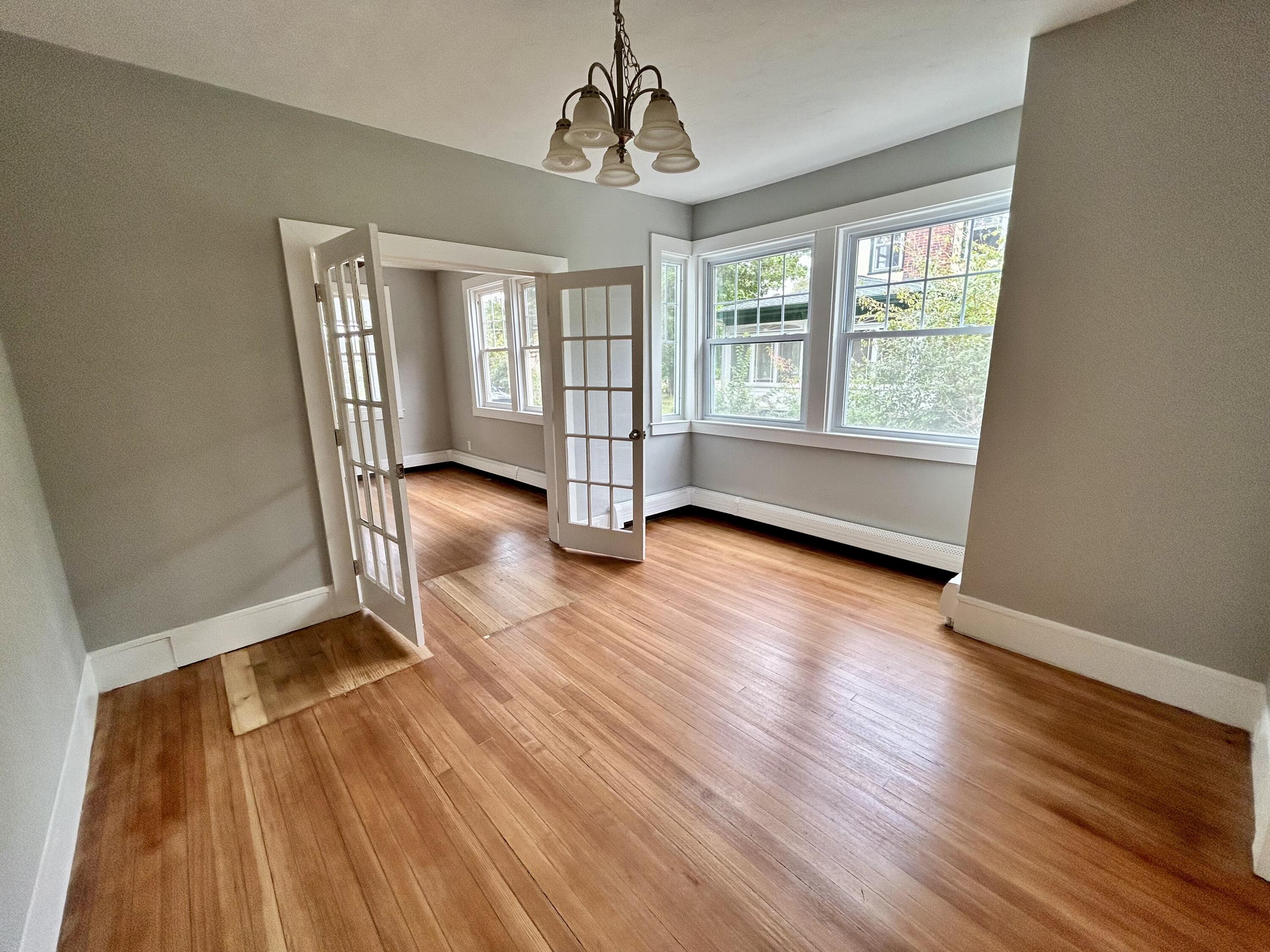 83 Marion Road Wareham, MA 02571 - Photo 22 of 32 a view of livingroom with hardwood floor and window