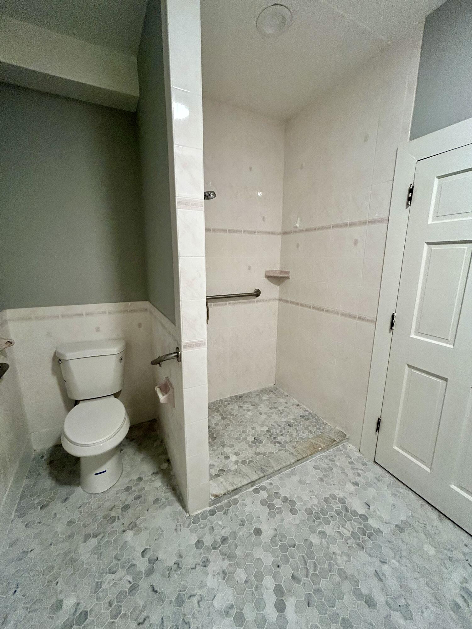 83 Marion Road Wareham, MA 02571 - Photo 23 of 32 a bathroom with a toilet and a shower