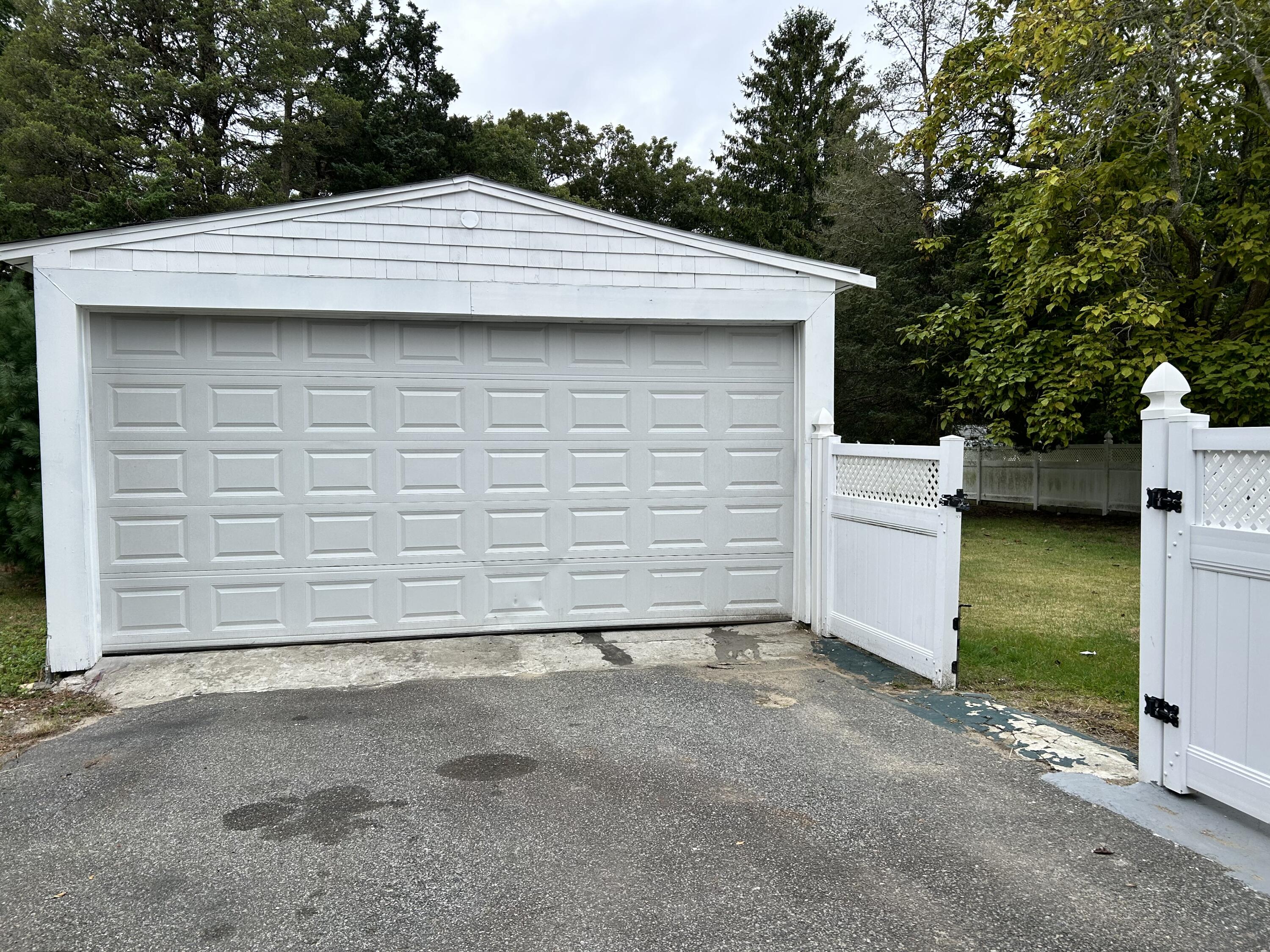 83 Marion Road Wareham, MA 02571 - Photo 24 of 32 a view of a house with a garage