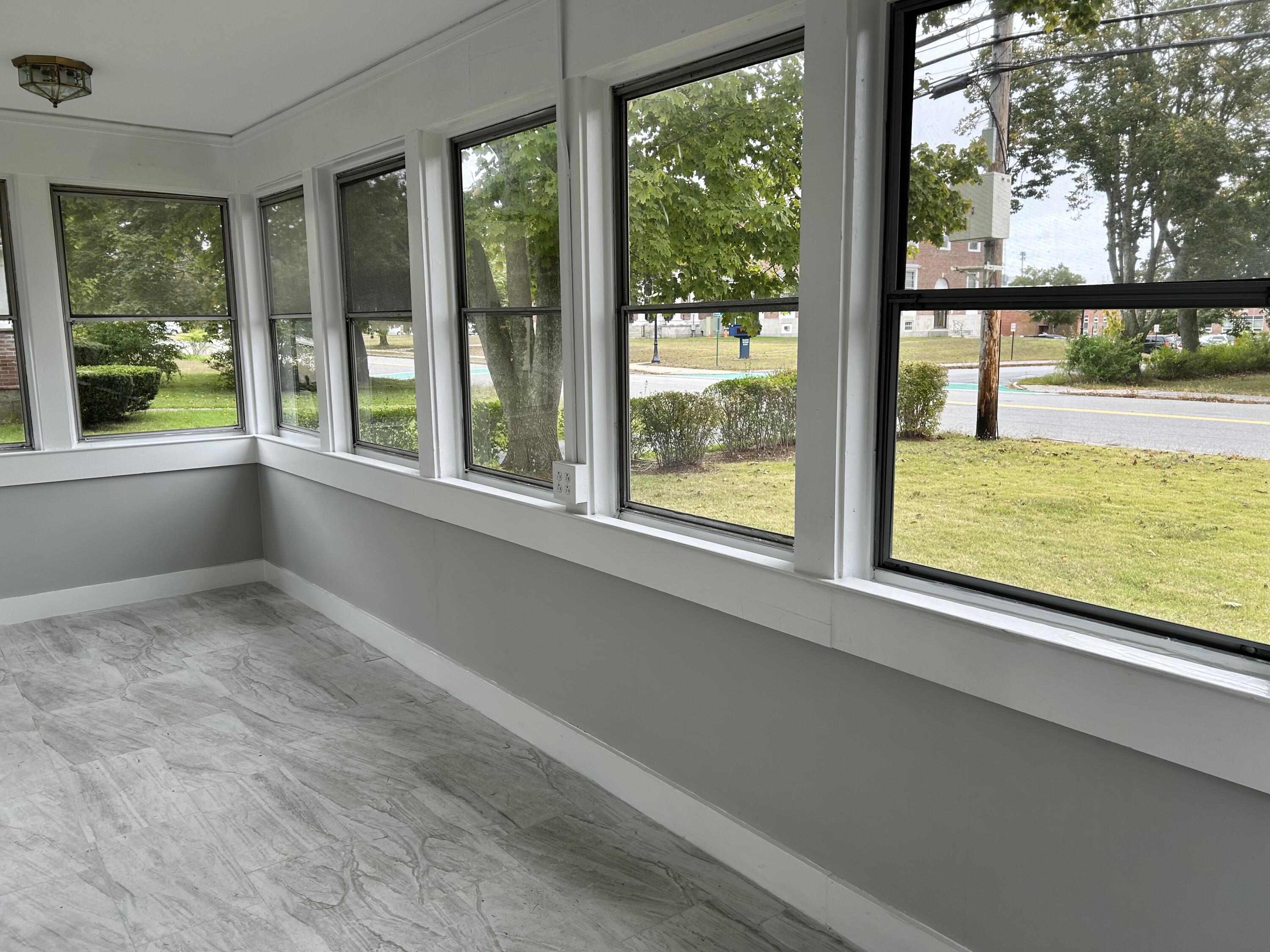 83 Marion Road Wareham, MA 02571 - Photo 3 of 32 a view of an empty room with a window