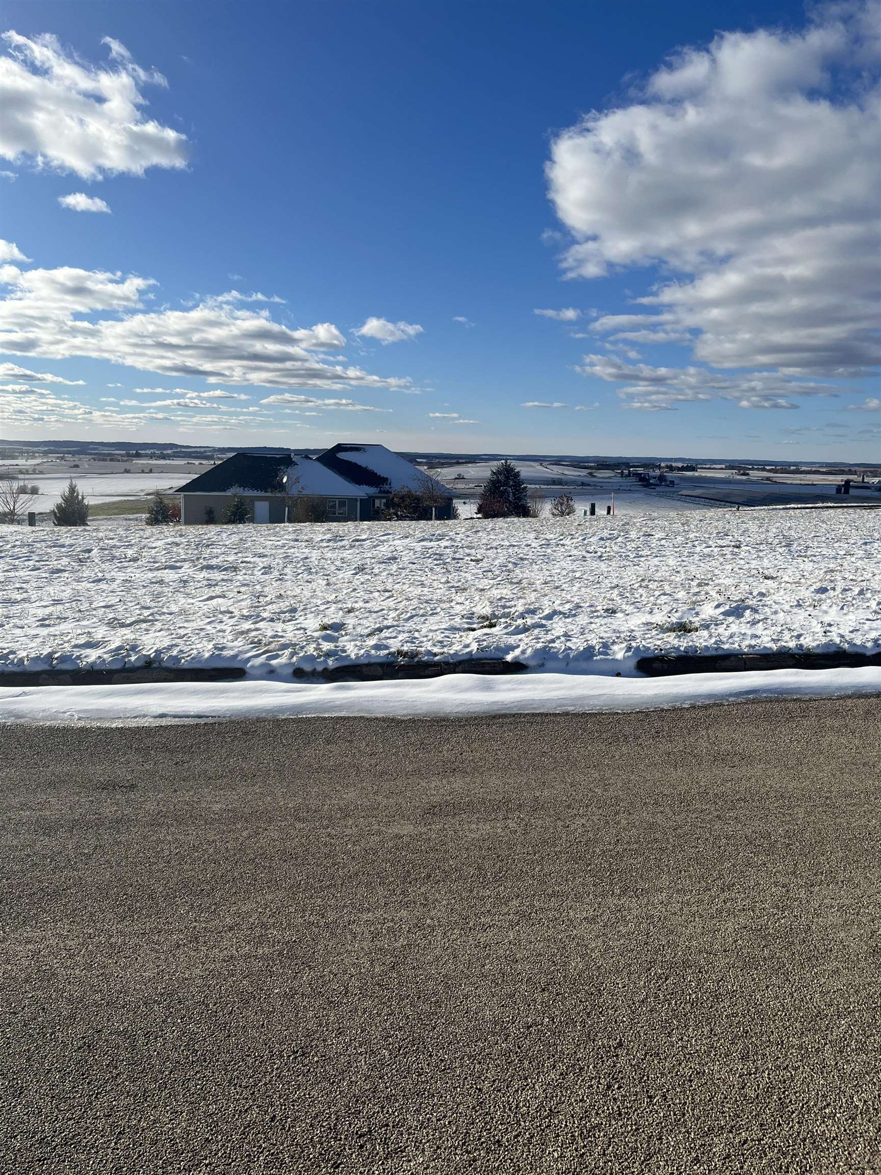 a view of room with wooden floor